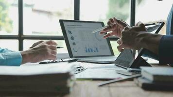 Financial Business team present. Business man hands hold documents with financial statistic stock photo, discussion, and analysis report data the charts and graphs. Finance Financial concept video