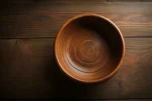 Empty wooden bowl on wooden background. Top view. Copy space. ai generative photo