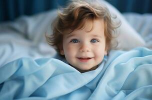 Portrait of a cute little boy on a blue fabric background AI Generated photo