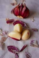 garlic cloves on the table photo