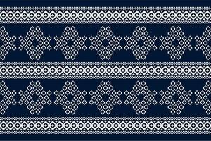 Ethnic geometric fabric pattern Cross Stitch.Ikat embroidery Ethnic oriental Pixel pattern blue background. Abstract,vector,illustration. Texture,clothing,frame,decoration,motifs,silk wallpaper. vector