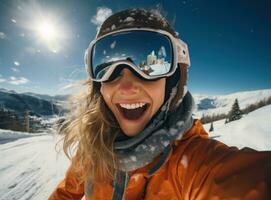 Skateboarder girls snowboarding on top of mountain photo