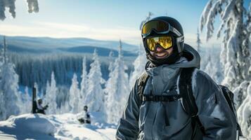 Man in ski goggles rides a snowboard from a snowy mountain photo