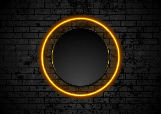Orange neon circle on grunge brick wall background