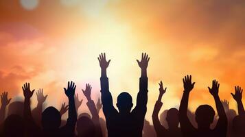 Silhouette of a group of people raising their hands in the air, human rights day photo