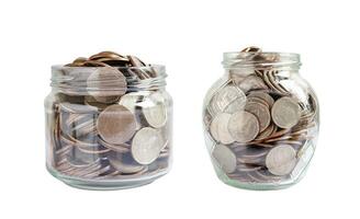 Coins in glass jar isolated on white background with clipping path, Business finance saving money banking investment concept. photo