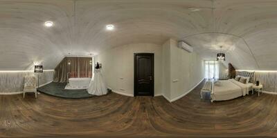 360 hdri panorama in interior of vip wooden eco bedroom in rustic style homestead on mansard floor with rafter ceiling in equirectangular projection with zenith and nadir. VR AR content photo