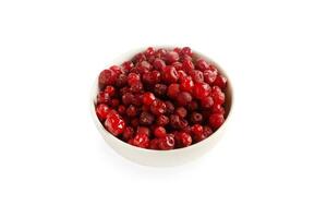 Frozen cranberry in white background. Close up food photo