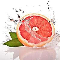 Fresh grapefruit in water splash on white backround. Juicy fruit. photo