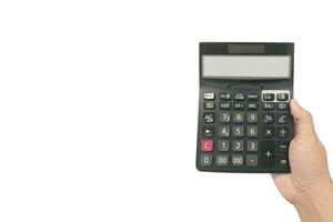Close up hand of businessman holding black calculator to calculating isolated on white background photo