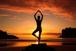 Beach sunrise with yoga practice photo