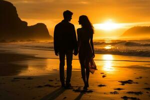 Couple on beach at sunrise photo