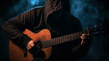 hombre jugar en acústico guitarra en el oscuro generativo ai foto