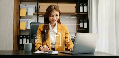 E-document management Paperless workplace, e-signing, electronic signature, document management. businessman signs an electronic document on a virtual notebook screen using a stylus pencil. photo