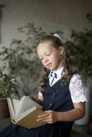 Primary school girl, in school uniform photo