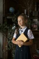 Primary school girl, in school uniform photo