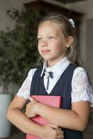 Primary school girl, in school uniform photo