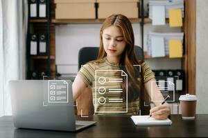 E-document management Paperless workplace, e-signing, electronic signature, document management. woman signs an electronic document on a virtual notebook screen using a stylus pencil. photo