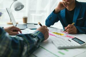 Businessmen team in conference room are introducing and consulting each other to make good business profits. concept of mentoring and consulting between investor to exchange knowledge. photo