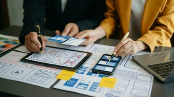 UX graphic designer planning application process development prototype wireframe for web smart phone. Creative digital development agency. photo