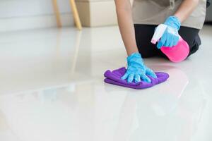 cleaning staff is cleaning room for customers who want  cleaning staff to clear room before staying in next round for cleanliness. concept of hiring Cleaner staff from the Cleaner Company photo