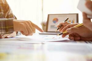 Businessmen team in conference room are introducing and consulting each other to make good business profits. concept of mentoring and consulting between investor to exchange knowledge. photo