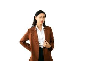 Portrait photo of young beautiful Asian woman feeling happy and holding smart phone, tablet and laptop with black empty screen on white background product presenting concept.