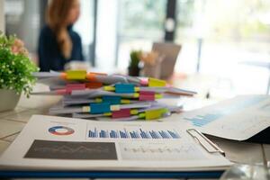 A huge stacked documents is an annual earnings summary document prepared for business people to use in attending meetings and this stacked paper is also an important document. photo