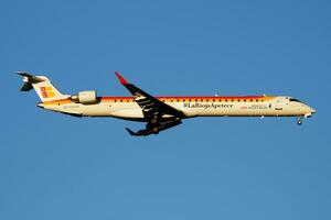 Iberia Regional Air Nostrum Bombardier CRJ-1000 EC-LOI passenger plane landing at Madrid Barajas Airport photo