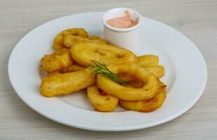 Fried calamari rings photo