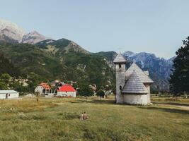 Theth Church - Kisha e Thethit - in Theth, Albania by Drone photo