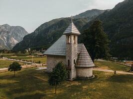 Theth Church - Kisha e Thethit - in Theth, Albania by Drone photo