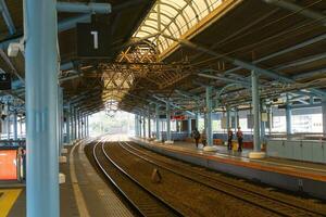 Jakarta, Indonesia  July 7, 2023 Empty trail rail during the day at Juanda Station photo