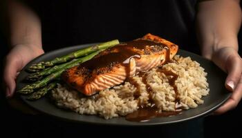 A la parrilla salmón filete con arroz y espárragos, un sano comida generado por ai foto