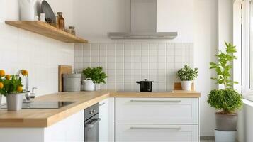 Sleek Elegance. Silver Cooker Hood in Minimalist White Kitchen with Natural Touches photo