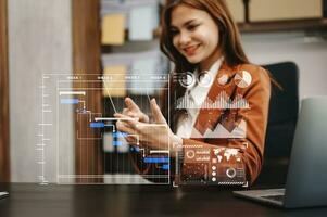 Businessman hand Project manager working and update tasks and Gantt chart scheduling virtual diagram.with smart phone, tablet and laptop in office. photo