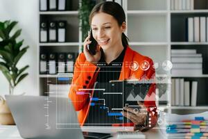 Businesswoman hand Project manager working and update tasks and Gantt chart scheduling virtual diagram.with smart phone, tablet and laptop photo