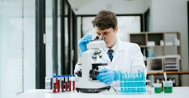 Modern medical research laboratory. female scientist working with micro pipettes analyzing biochemical samples, advanced science chemical laboratory photo