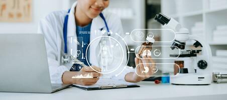 DNA molecule testing concepts. The doctor in a mask examines DNA molecules on the chemical laboratory with virtual icon photo