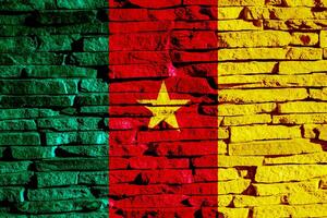 Flag of the Republic of Cameroon on a textured background. Concept collage. photo