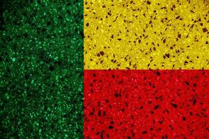 Flag of Republic of Benin on a textured background. Concept collage. photo