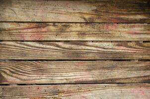 Background of horizontal wooden boards. Texture of box planks. Wood is susceptible to damage by the bark beetle. photo