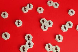 Hexagonal figures of people. Hiring new employees and recruiting staff. Personnel management. Human resources. Find candidate for an open role job. Society and social groups. Public relations photo