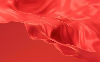 A red silk cloth is draped over a table with soft light on it