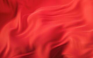 A red silk cloth is draped over a table with soft light on it