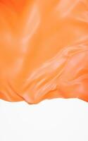 Flowing orange cloth background, 3d rendering. photo