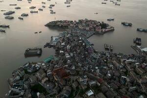 Seaside port with residental houses around, in Taizhou, Zhejiang. photo