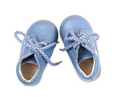 Old blue baby shoes photo
