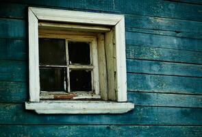 Blue wooden wall, window photo