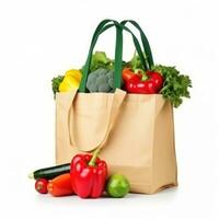Shopping bag with groceries isolated photo
